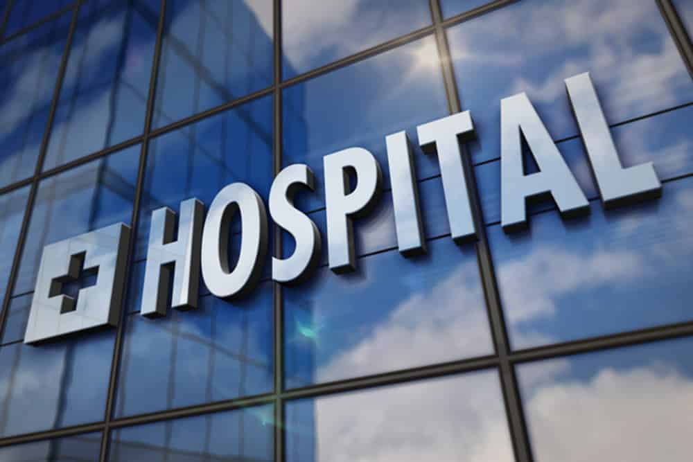Closeup View of Hospital Sign with Glass Windows